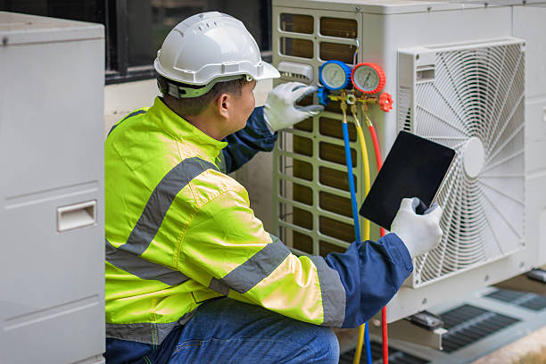 Professional Hvac technician working in Docena, AL
